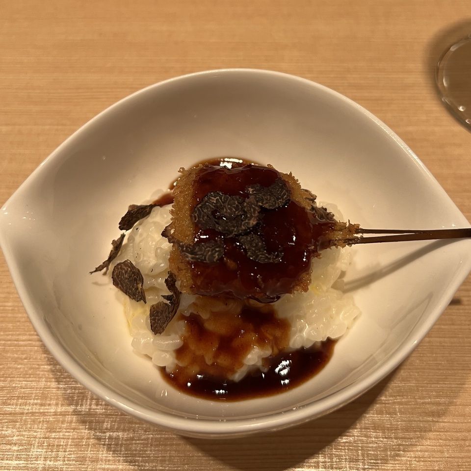 Seasonal skewered fried food course with wine, foie gras risotto