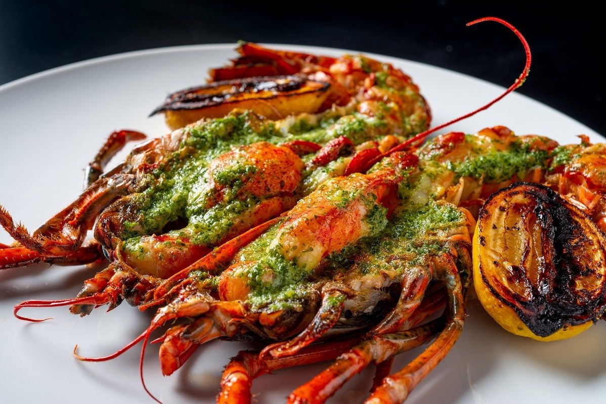 Limited Quantity, Reservations Required: Live Lobster [1 lobster] grilled on lava stone + side buffet