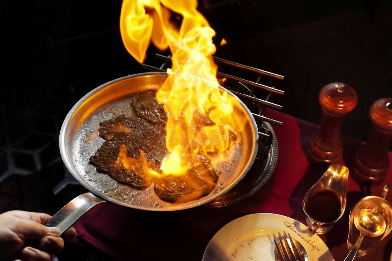 Paper Thin Filet of Beef Flambé Course